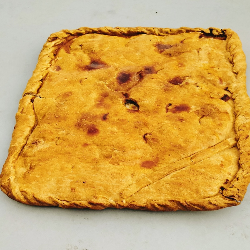 EMPANADA DE POLO CON CHAMPIÑÓNS